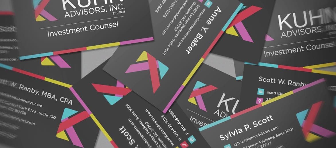 Business cards with the Kuhn Advisors logo