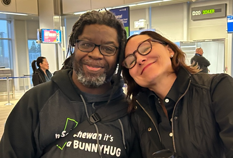 Lauren Rivers with Jamal Walton (team member) at airport