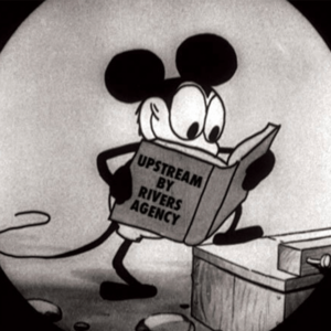Mickey Mouse reading Upstream by Rivers Agency book